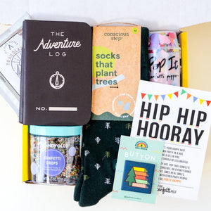 Graduation Gift Box for him: filled with adventure log, tree green socks, candy, and confetti