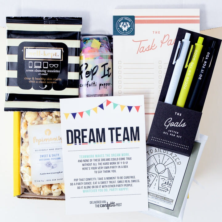 Employee Appreciation Gift Box filled with Dream Team Card on top along with pens, notepad, confetti, and popcorn