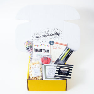 Employee Appreaciation Gift Box open with gifts spilling outside topped with a Dream Team Greeting Card