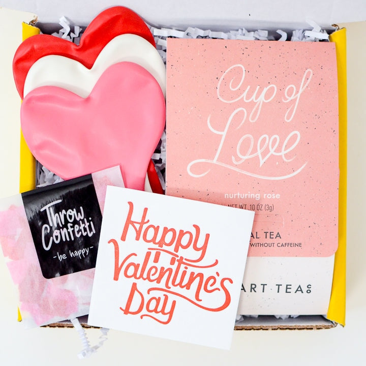 Budget Friendly Valentine's GIft Box Delivery to send in the mail for galentine's and long distance boyfriends and girldfriends_Cup of Love Tea, three heart balloons, confetti and Happy Valentine's Day Card