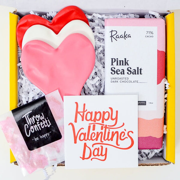 Galentine's Day Gift Ideas_Small Valentine's Care Package with treat, confetti, and three heart balloons