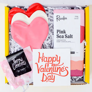 Galentine's Day Gift Ideas_Small Valentine's Care Package with treat, confetti, and three heart balloons